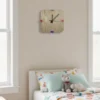 dice-wall-clock-there-is-a-clock-on-the-wall-above-a-bed-in-a-bedroom-1